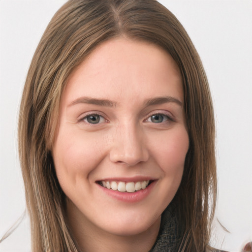 Joyful white young-adult female with long  brown hair and grey eyes