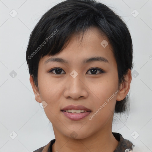 Joyful asian young-adult female with medium  black hair and brown eyes