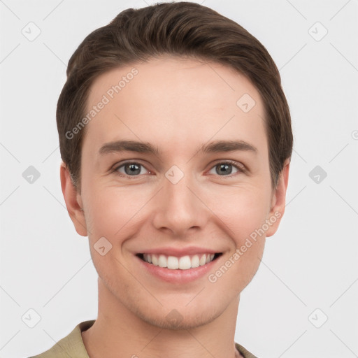 Joyful white young-adult female with short  brown hair and grey eyes