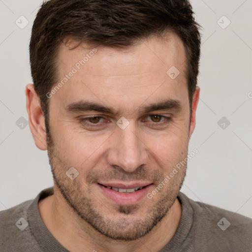 Joyful white adult male with short  brown hair and brown eyes