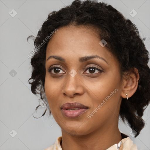 Joyful black young-adult female with medium  brown hair and brown eyes