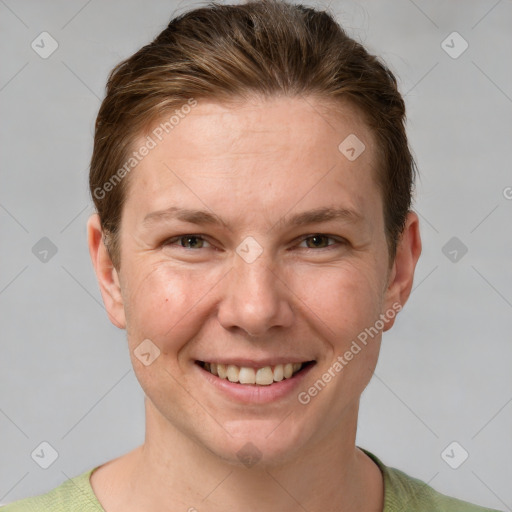 Joyful white adult female with short  brown hair and grey eyes