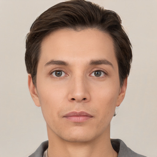 Neutral white young-adult male with short  brown hair and brown eyes