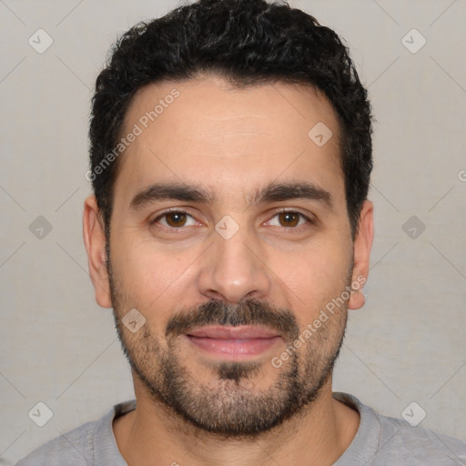 Joyful white young-adult male with short  black hair and brown eyes