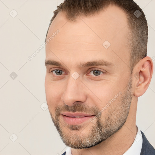 Joyful white adult male with short  brown hair and brown eyes