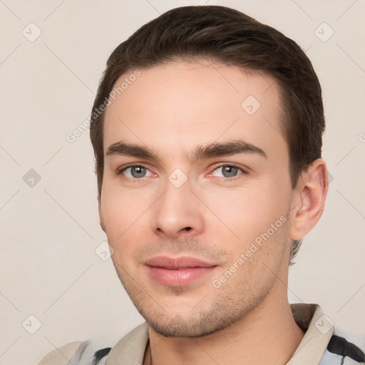 Joyful white young-adult male with short  brown hair and brown eyes