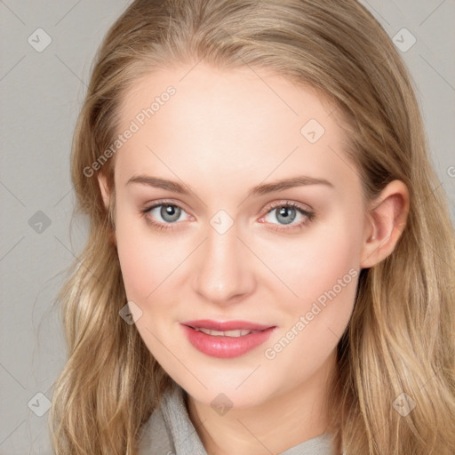 Joyful white young-adult female with long  brown hair and blue eyes