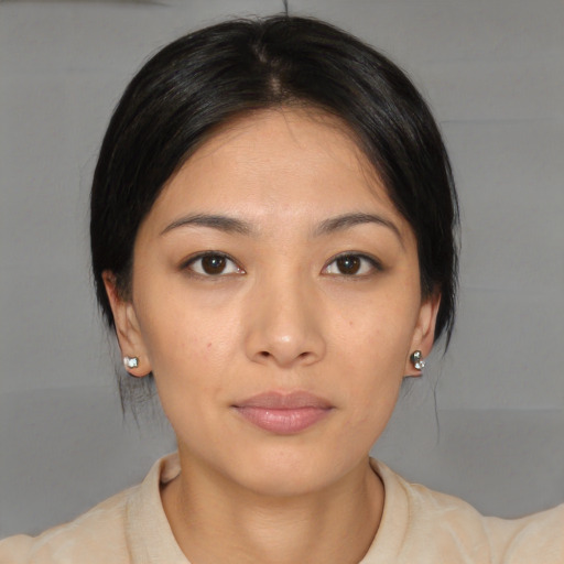 Neutral asian young-adult female with medium  brown hair and brown eyes