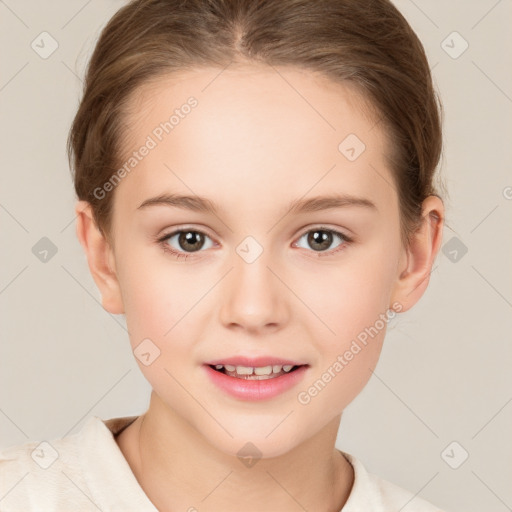 Joyful white child female with short  brown hair and brown eyes