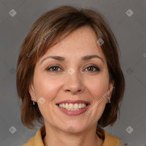 Joyful white adult female with medium  brown hair and brown eyes