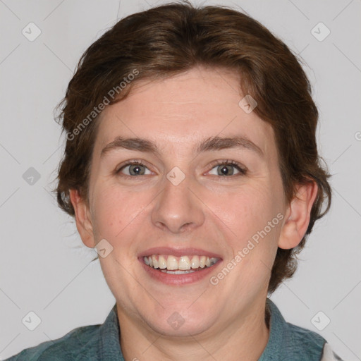 Joyful white adult female with medium  brown hair and blue eyes