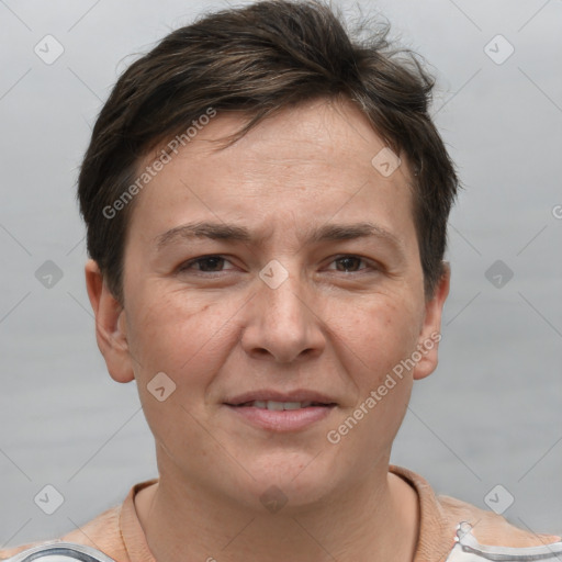 Joyful white adult female with short  brown hair and grey eyes