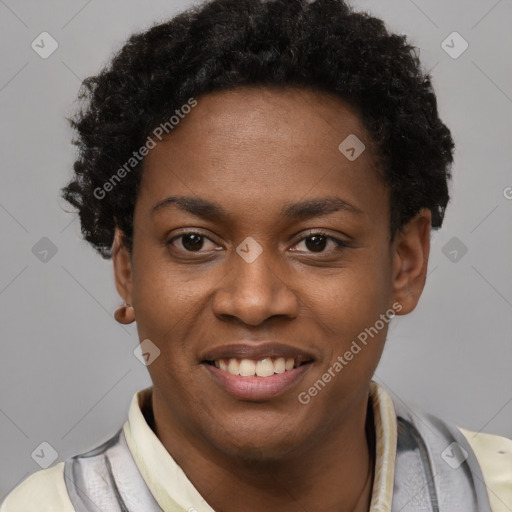 Joyful black young-adult female with short  brown hair and brown eyes