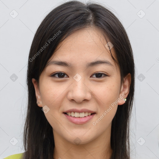 Joyful asian young-adult female with long  brown hair and brown eyes