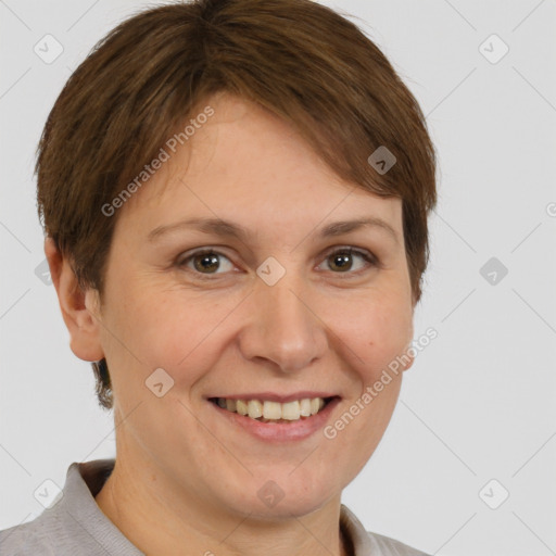 Joyful white adult female with short  brown hair and brown eyes