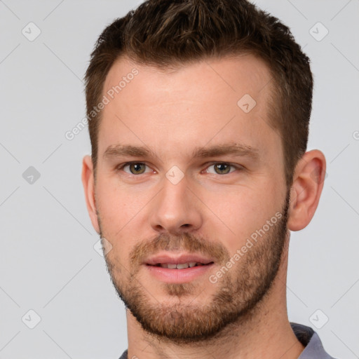 Neutral white young-adult male with short  brown hair and grey eyes