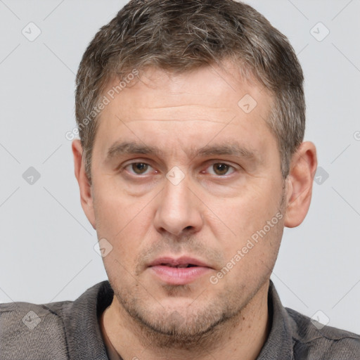 Neutral white adult male with short  brown hair and brown eyes