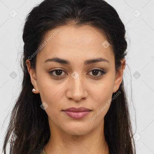 Joyful latino young-adult female with long  brown hair and brown eyes