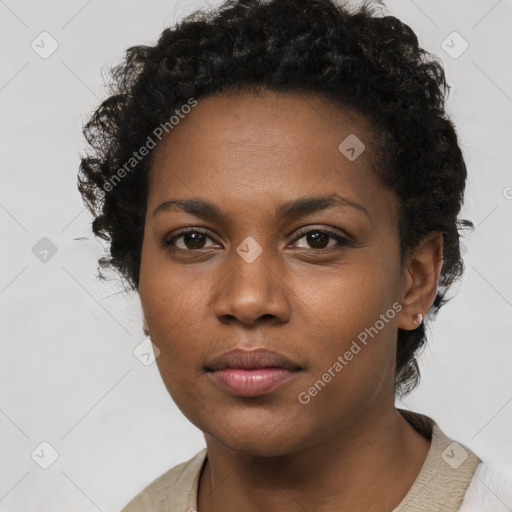 Neutral black young-adult female with short  black hair and brown eyes