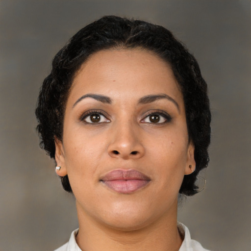 Neutral latino young-adult female with short  brown hair and brown eyes