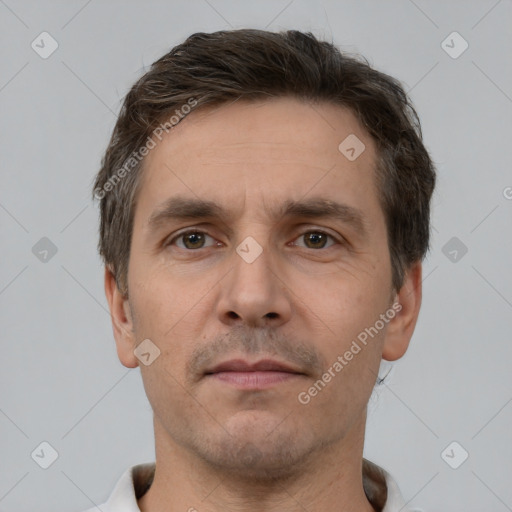 Neutral white adult male with short  brown hair and brown eyes