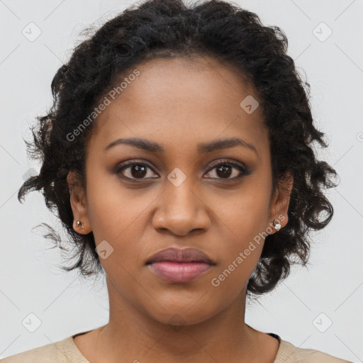 Joyful black young-adult female with long  brown hair and brown eyes