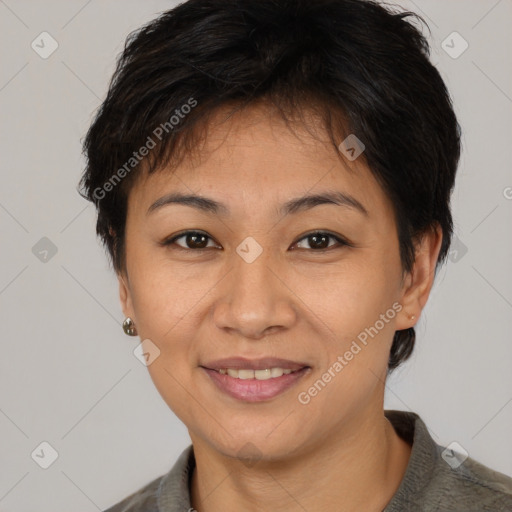 Joyful latino young-adult female with short  brown hair and brown eyes