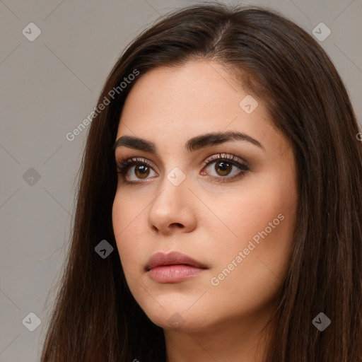 Neutral white young-adult female with long  brown hair and brown eyes