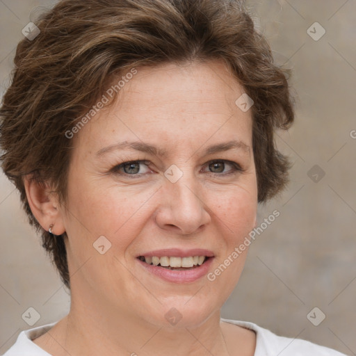 Joyful white adult female with short  brown hair and brown eyes