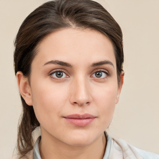 Neutral white young-adult female with medium  brown hair and grey eyes