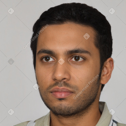 Neutral latino young-adult male with short  black hair and brown eyes