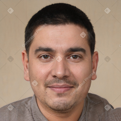 Joyful white young-adult male with short  black hair and brown eyes
