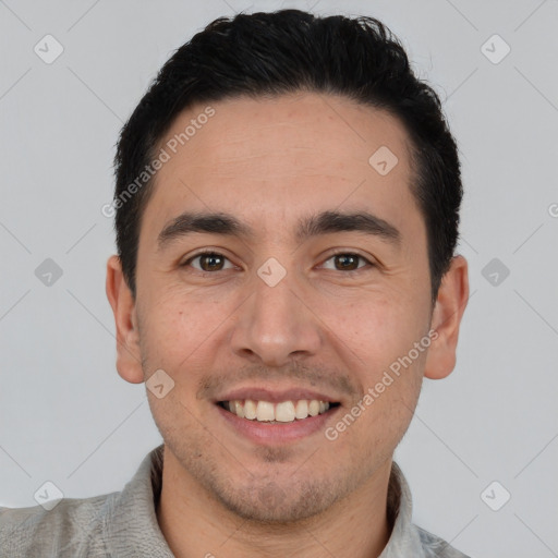 Joyful white young-adult male with short  black hair and brown eyes