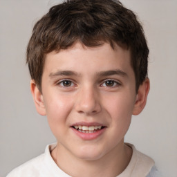 Joyful white child male with short  brown hair and brown eyes