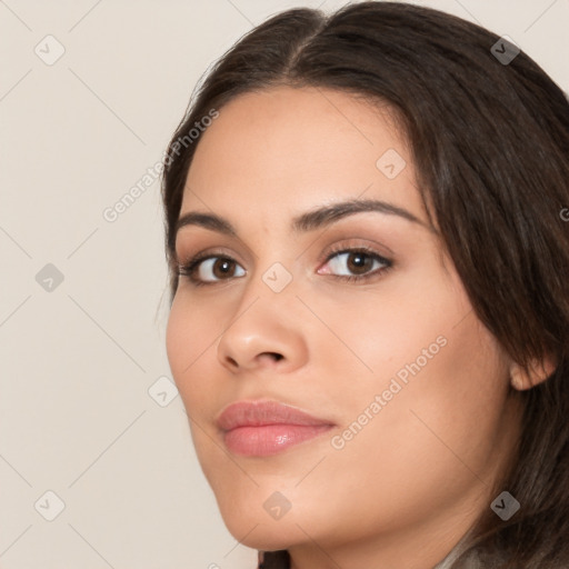 Neutral white young-adult female with medium  brown hair and brown eyes