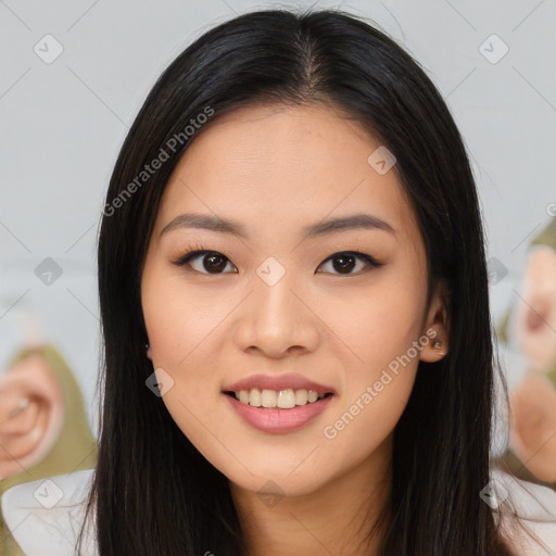 Joyful asian young-adult female with long  black hair and brown eyes