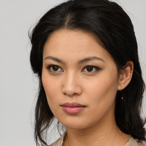 Neutral asian young-adult female with medium  brown hair and brown eyes