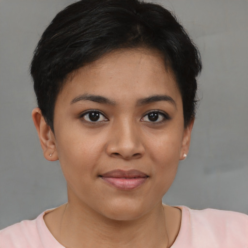 Joyful asian young-adult female with short  brown hair and brown eyes