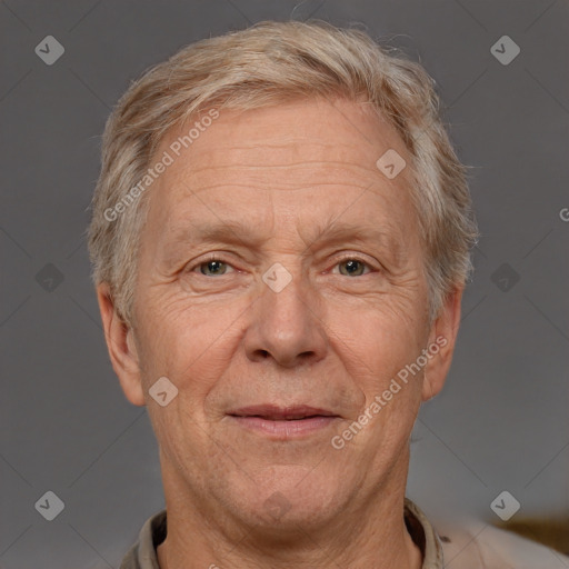 Joyful white middle-aged male with short  gray hair and brown eyes