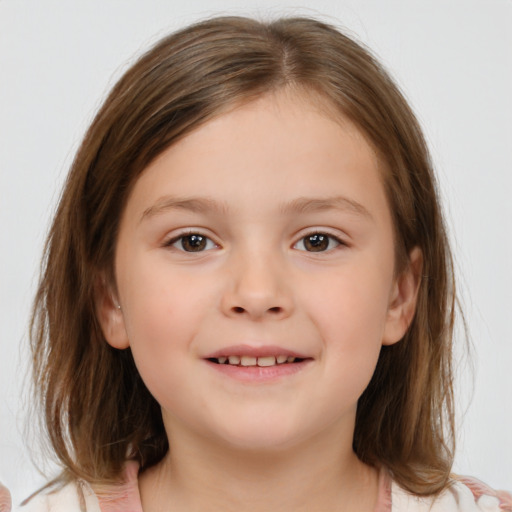 Joyful white child female with medium  brown hair and brown eyes