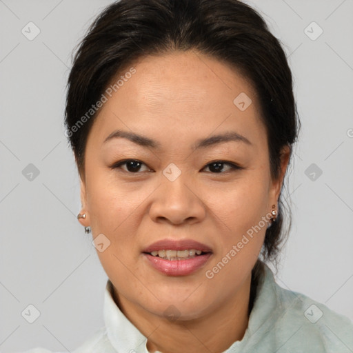 Joyful white adult female with medium  brown hair and brown eyes