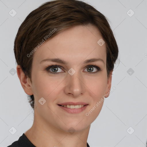 Joyful white young-adult female with short  brown hair and grey eyes