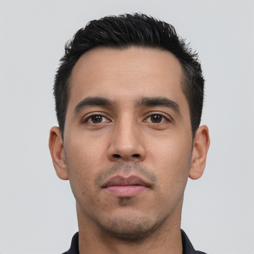 Neutral latino young-adult male with short  black hair and brown eyes