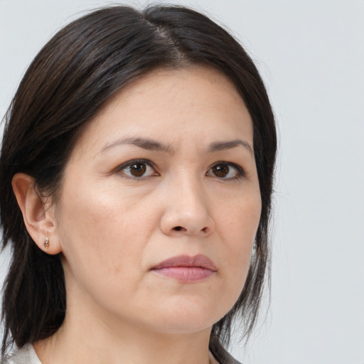 Neutral white adult female with medium  brown hair and brown eyes