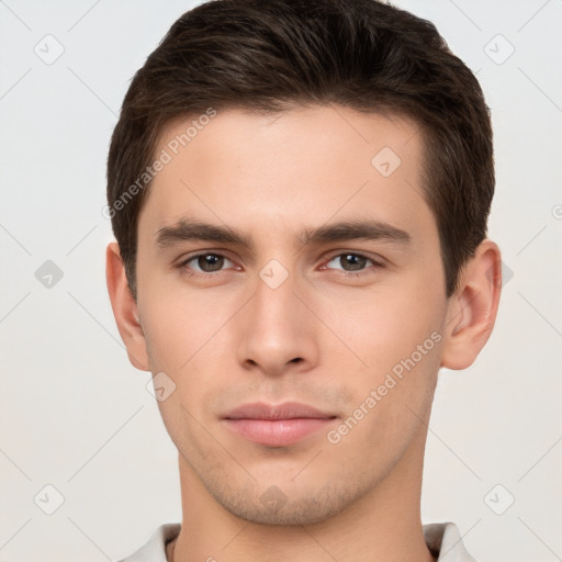 Neutral white young-adult male with short  brown hair and brown eyes