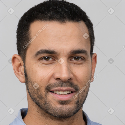 Joyful white young-adult male with short  black hair and brown eyes