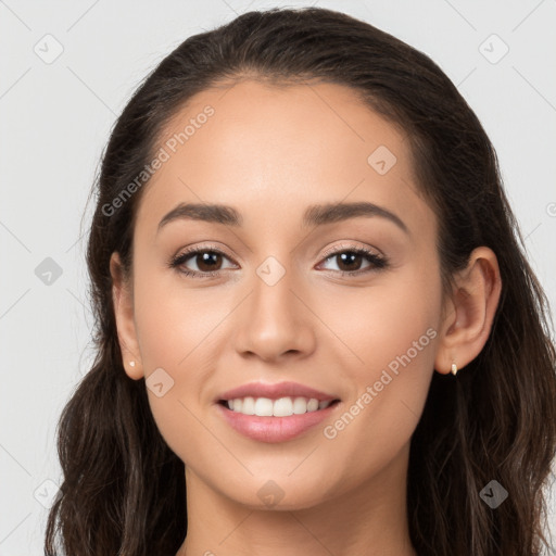 Joyful white young-adult female with long  brown hair and brown eyes