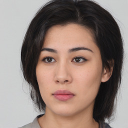 Neutral asian young-adult female with medium  brown hair and brown eyes