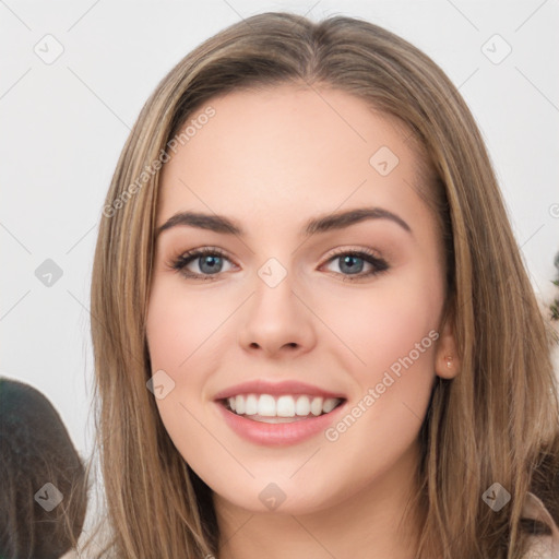 Joyful white young-adult female with long  brown hair and green eyes