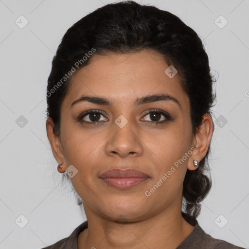 Joyful latino young-adult female with short  black hair and brown eyes